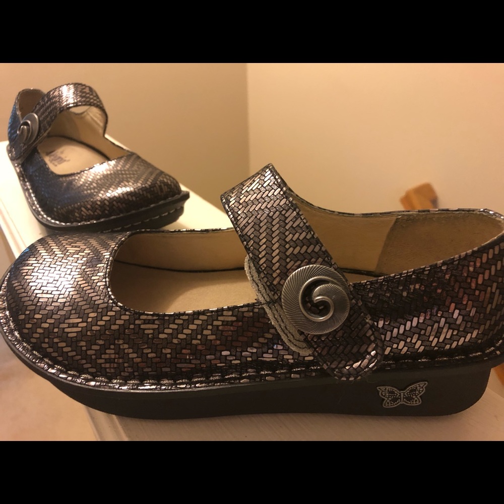 Alegria Paloma’s. Shiny black/multi tone accents.
